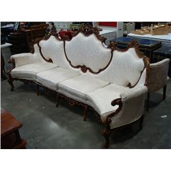 REPRODUCTION CARVED ANTIQUE SYTLE SOFA 8 AND 1/2 FEET LONG