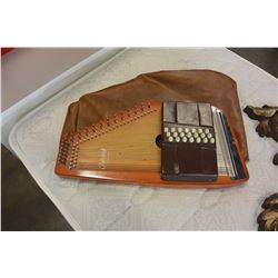 AUTO HARP BY OSCAR SCHMIDT WITH CASE