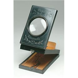 Cabinet Card Viewer, A small tabletop cabinet card viewer with adjustable tilting base. Wood co...