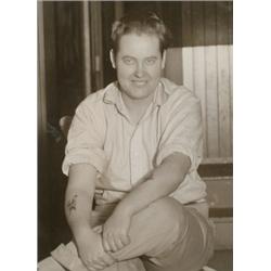 KAPITOLA COOPER, a gelatin silver print of Kapitola Cooper, a woman author disguised as a man in...