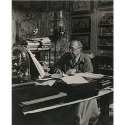 Brandt, Bill (1904-1983), OSBERT SITWELL, a gelatin silver print of Osbert Sitwell at his writi...