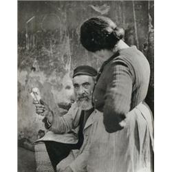 Vishniac, Roman (1897-1990), A gelatin silver print of a bearded gentleman holding a turnip wit...