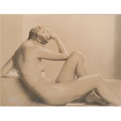 Wilding, Dorothy (1893-1976), NUDE STUDY, a warm-toned silver print circa 1920's. Signed in pen...