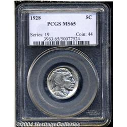 1928 5C MS65 PCGS. A lightly toned example