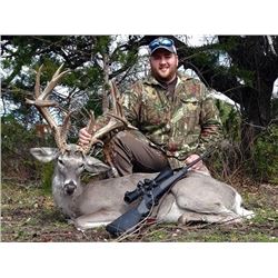 Texas Whitetail and exotic hunt for two hunters ($4000 credit)