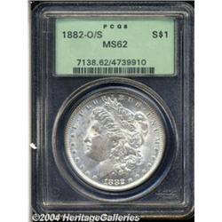 1882-O/S S$1 MS62 PCGS. With a magnifier the