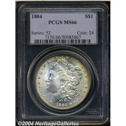 1884 S$1 MS66 PCGS. A beautiful blend of aqua,