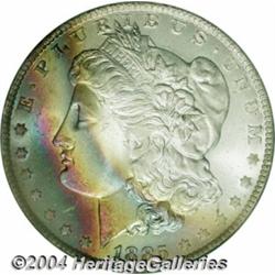 1885-O S$1 MS66 PCGS. Glorious bands of