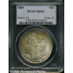 1889 S$1 MS65 PCGS. Gray-gold toning, with