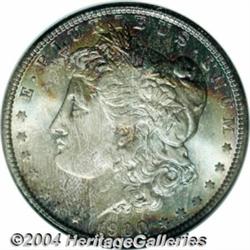 1900-O S$1 MS67 NGC. Well struck with rich,