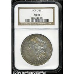 1904-O S$1 MS65 NGC. Aqua-green color around