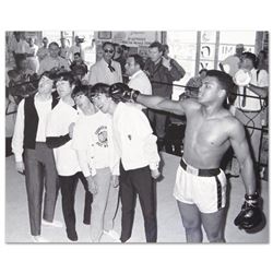 Ali Punching the Beatles by Ali, Muhammad