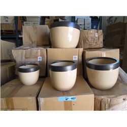 New 4 Piece Set of Glazed Ceramic Plant Pots