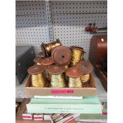 Wood Spools of Gold Stretch Cord & More