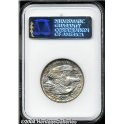 1921 50C Alabama 2x2 MS63 NGC. A magnifier