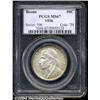 Image 1 : 1936 50C Boone MS67 PCGS. Gold toning rings
