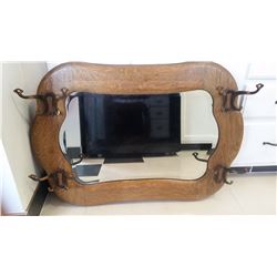 Oak framed coat/hat rack with beveled mirror 33" W x23 H