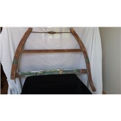 Painted saw 32" l x 27" h