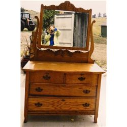 Fancy oak serpentine dresser , bev. mirror, 4 drawer