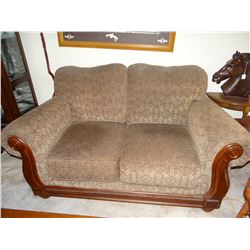 Brown love seat