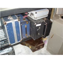 SEVEN VARIOUS MEDIUM SIZE SUITCASES