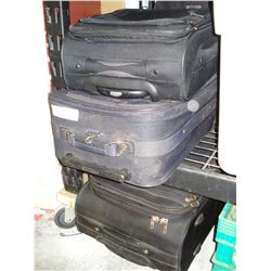 FOUR SUITCASES