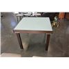 Image 1 : MODERN GLASSTOP DINING TABLE WITH TWO JACKNIFE LEAFS