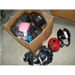 BOX OF BIKE HELMETS SPORTS PADS AND LOST PROPERTY ITEMS