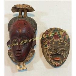 2 Hand Carved Faces