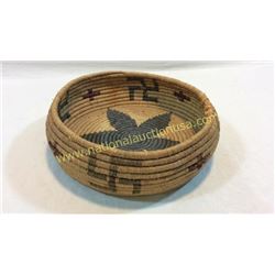 Early Woven Basket With Rolling Logs