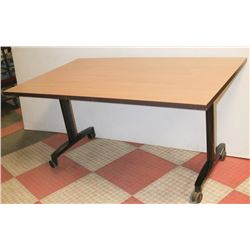 HEAVY DUTY WORK TABLE ON LOCKABLE WHEELS