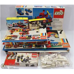 BOX FULL OF 1970S LEGO SETS WITH BOXES.