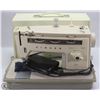 Image 1 : VINTAGE PORTABLE SINGER STYLUS 514 SEWING MACHINE