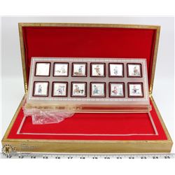 SET OF 12 CHINESE SILVER RABBIT MEDALLIONS IN CASE