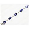 Image 1 : 50) 10K WHITE GOLD 12 TANZANITE BRACELET