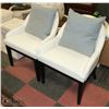 Image 1 : SHOWHOME PAIR OF WHITE LEATHERETTE SIDECHAIRS