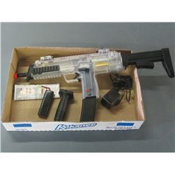 New Out of box Air Soft / comes with battery / clip / charger / manual