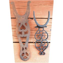 2 nice antique iron bootjacks