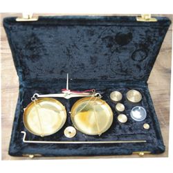 boxed set of gold scales