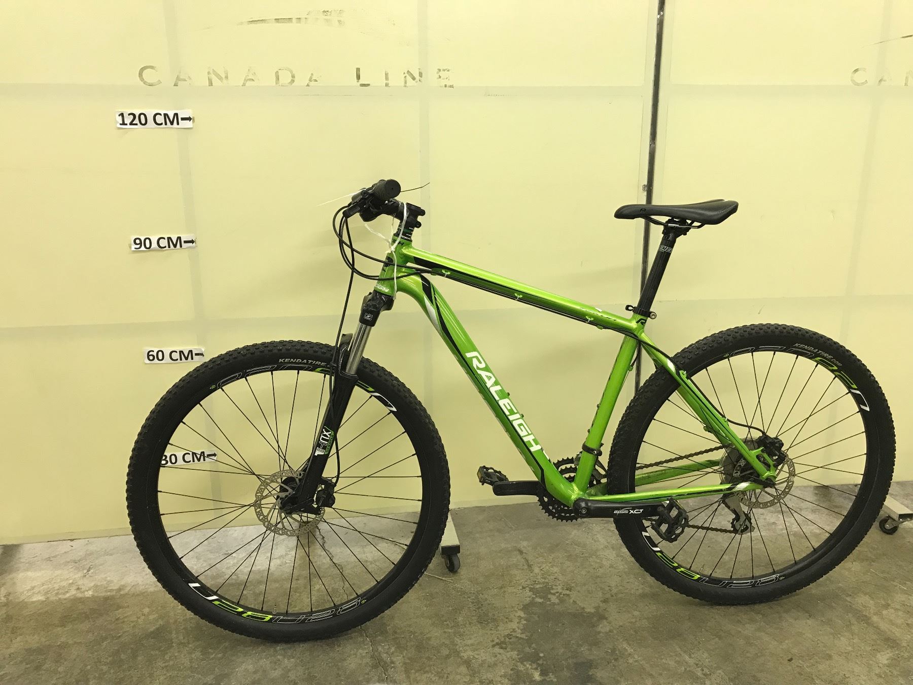 Green Raleigh Bike GREEN RALEIGH TEKOR 24 SPEED FRONT SUSPENSION MOUNTAIN BIKE - Able Auctions
