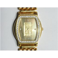 24KT. GOLD WATCH WITH 1GM PURE SWISS GOLD INGOT ON DIAL. RETAIL $1800