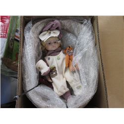 PORCELAIN DOLL WITH CARRIAGE