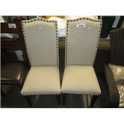 2 MATCHING BEIGE CLOTH STUDDED CHAIRS