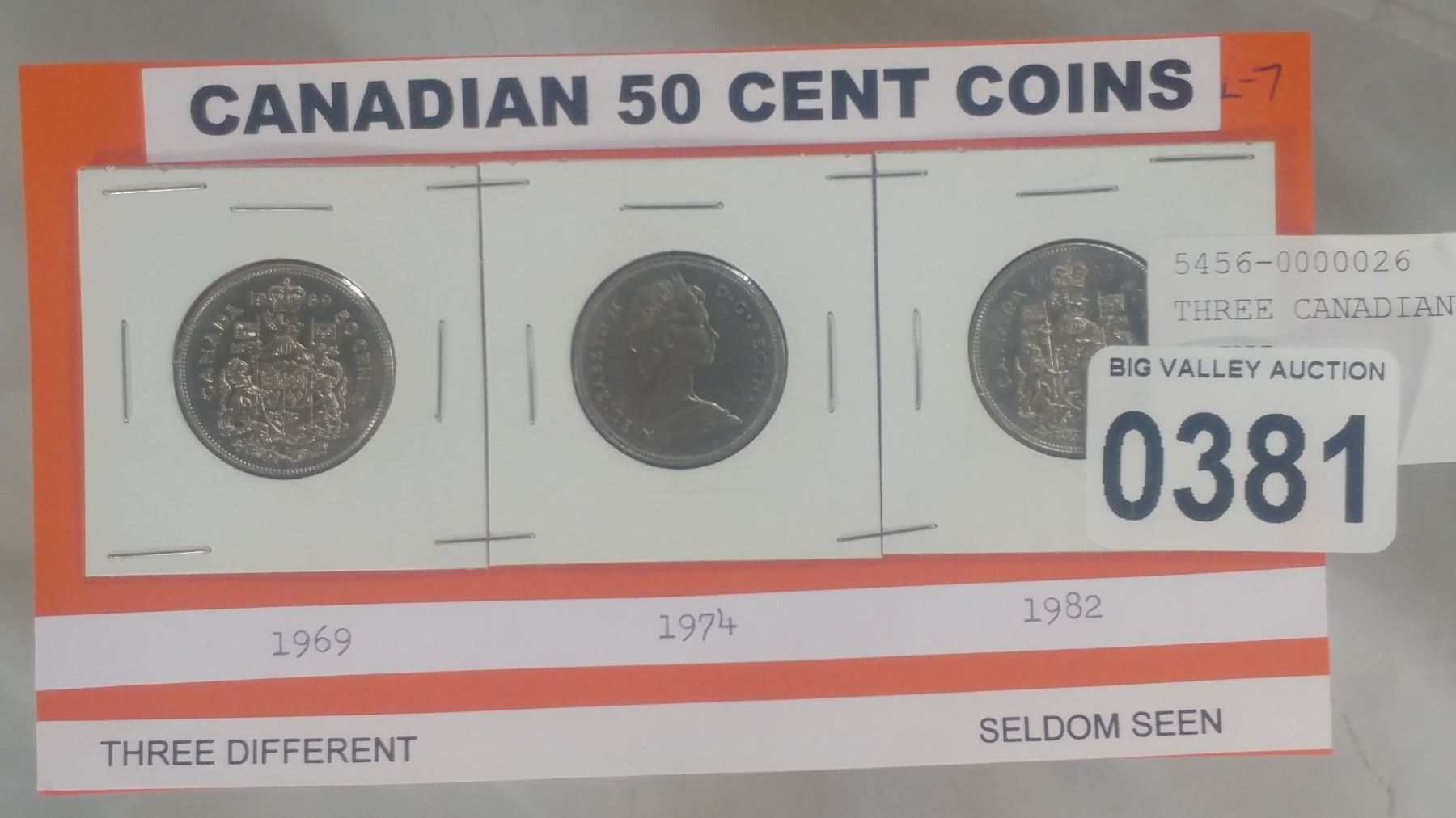 THREE CANADIAN FIFTY CENT COINS Big Valley Auction three-canadian-fifty-cent-coins-big-valley-auction