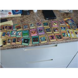 LOT OF YUGIOH AND POKEMON CARDS