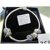 Image 1 : 1 PANDORA SILVER .925 BRACELET AND ASSORTED CHARMS