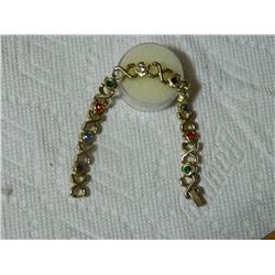 GOLD BRACELET WITH STONES