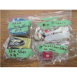 lot of miscellaneous 22 long rifle ammo 12 gauge slugs primers Etc