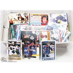 SMALL TOTE OF OVER 1000 HOCKEY CARDS.