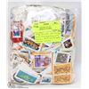 Image 1 : 1-1/2 POUND BAG OF ALL COMMEMORATE STAMPS -